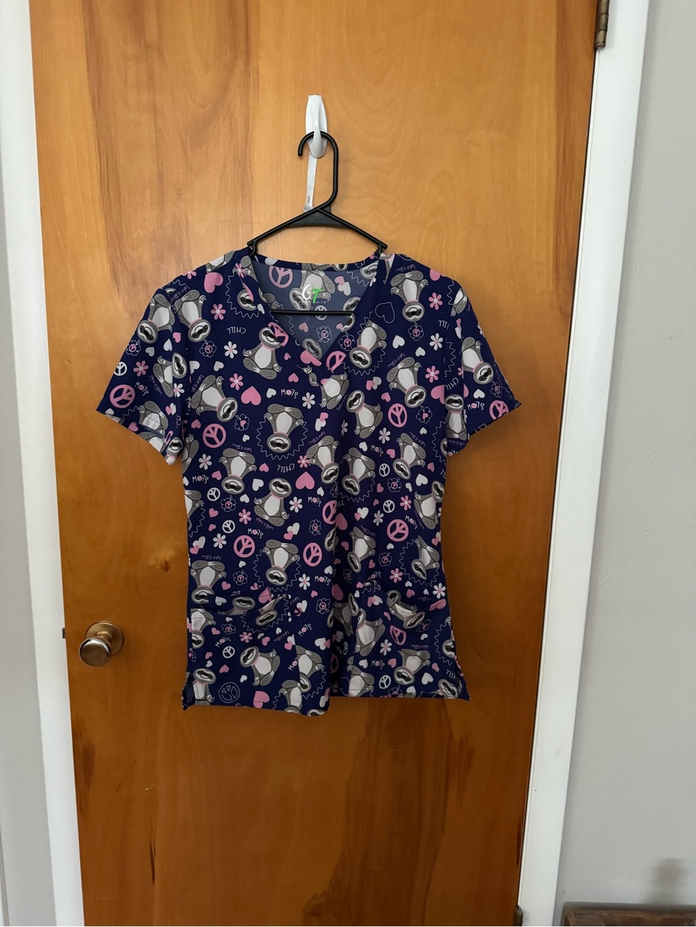 Navy Scrub Top with Sloth & Peace Sign Print